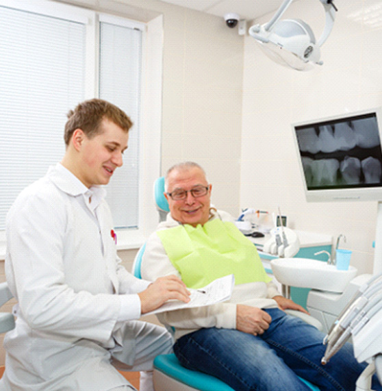 Man smiling in the dental chair