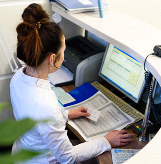 Receptionist at a desk