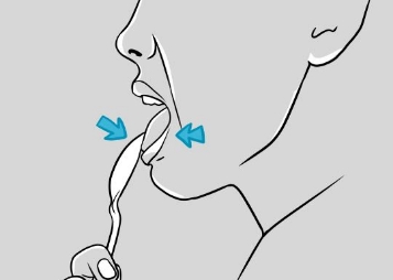 Illustrated person pressing their tongue against a spoon