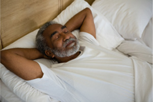 Man sleeping in bed